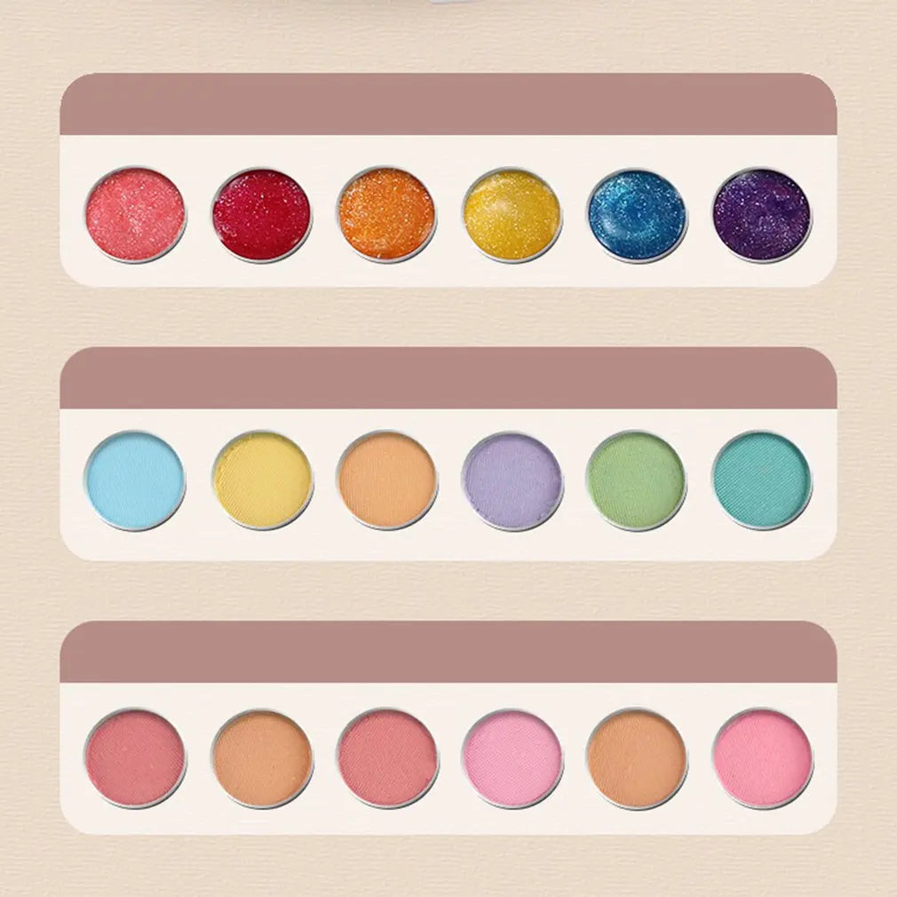 A collection of colorful cosmetic powders and pigments in various shades displayed in three separate palettes.
