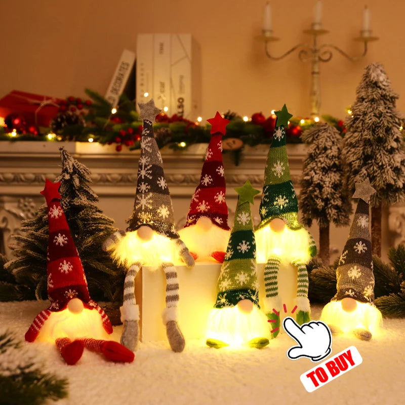 Battery-powered fairy lights shaped like Christmas trees illuminating a snowy scene.
