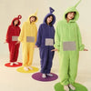 Four children dressed in Teletubbies-inspired one-piece pajamas with hoods and bright colors