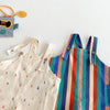 Colorful striped kids overalls featuring a raindrop print on the fabric.