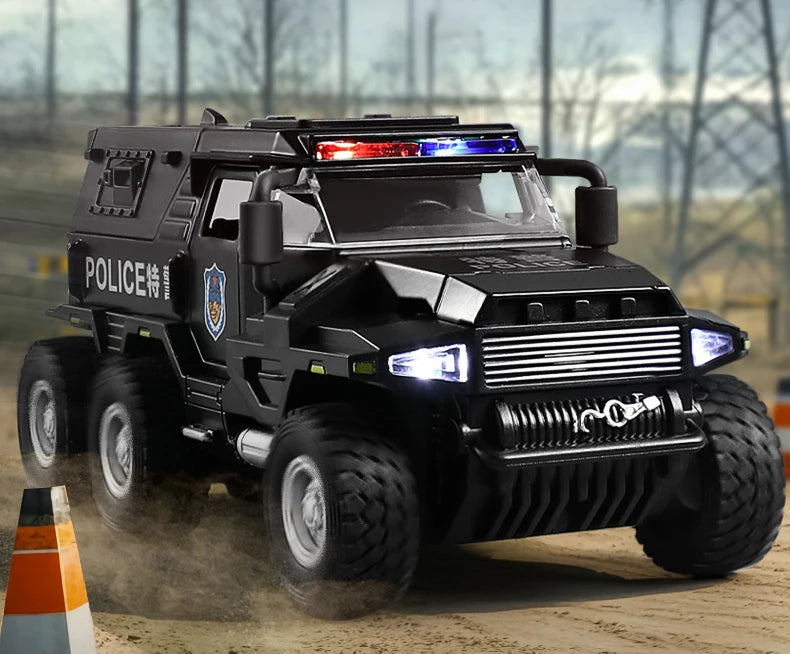 A black SWAT City Police truck diecast toy with lights and sounds driving on a dirt road.