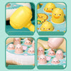 A set of yellow and pink Montessori animal hammer toys for toddlers, featuring pig and other animals.