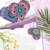 A set of six DIY mandala flower diamond art bookmarks featuring vibrant pink, purple, and teal patterns on a white book.