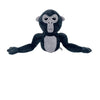 A dark gray and black plush toy of a monke gorilla with large eyes.