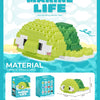A box set of Marine Life building blocks featuring a green penguin sea animal model.