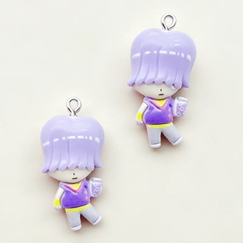 A pair of purple cartoon resin pendant charms featuring short hair and clothing for DIY jewelry making.