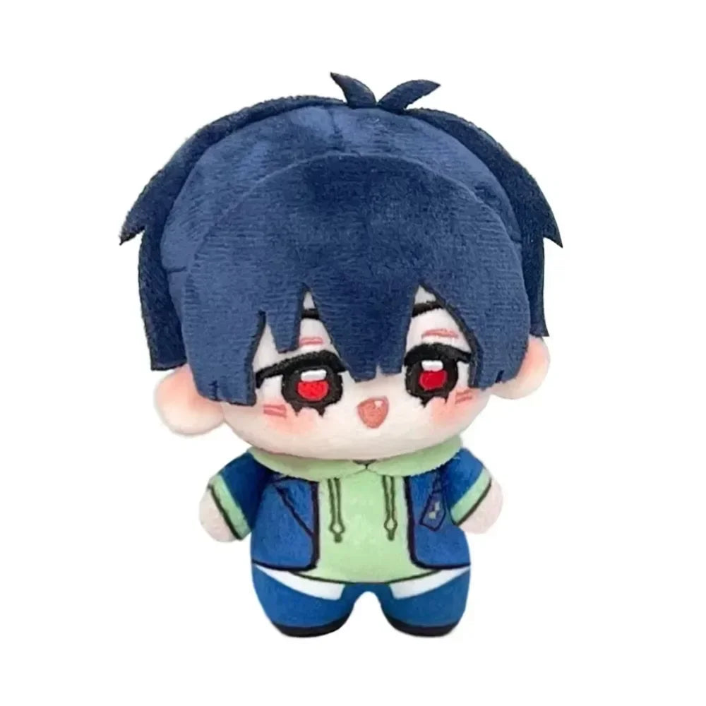 A plush doll of an anime character with dark blue hair and large red eyes wearing a blue jacket.