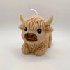 A light beige silicone mold shaped like a Highland cow head for crafting.