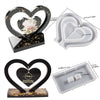 A set of heart-shaped silicone molds for resin casting, including a frame mold and a flat tray mold.
