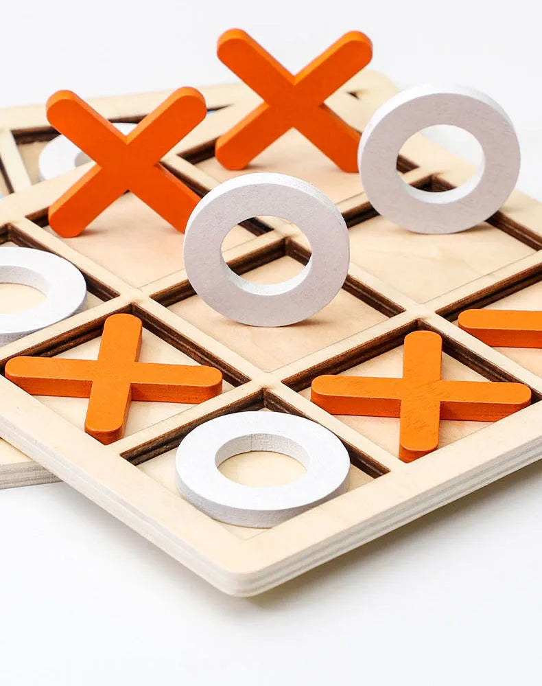 Wooden tic tac toe board game with orange and gray wooden X and O pieces