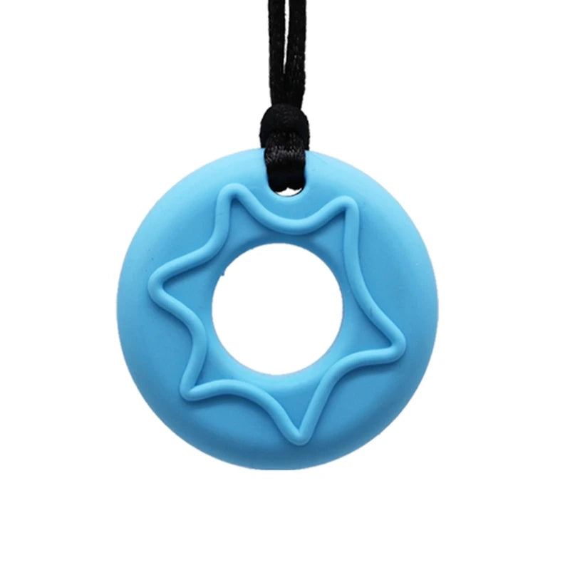 Light blue silicone chew necklace with a star-shaped hole and black cord.