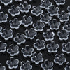 A close-up view of a 50-piece set of clear glass cherry blossom flower beads for jewelry making