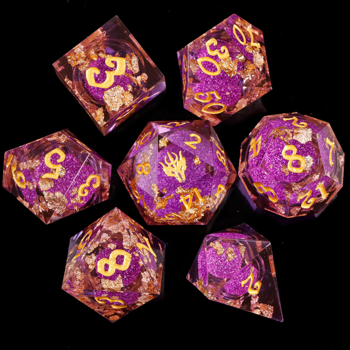 A collection of translucent purple dice with gold markings, set against a black background.