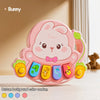 A pink bunny-shaped button background color random musical piano toy for kids
