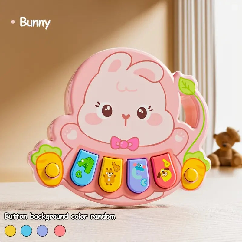 A pink bunny-shaped button background color random musical piano toy for kids