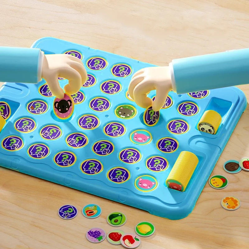 A hand is playing an Animal Flip Chess Game on a blue board with colorful animal pieces and dice.