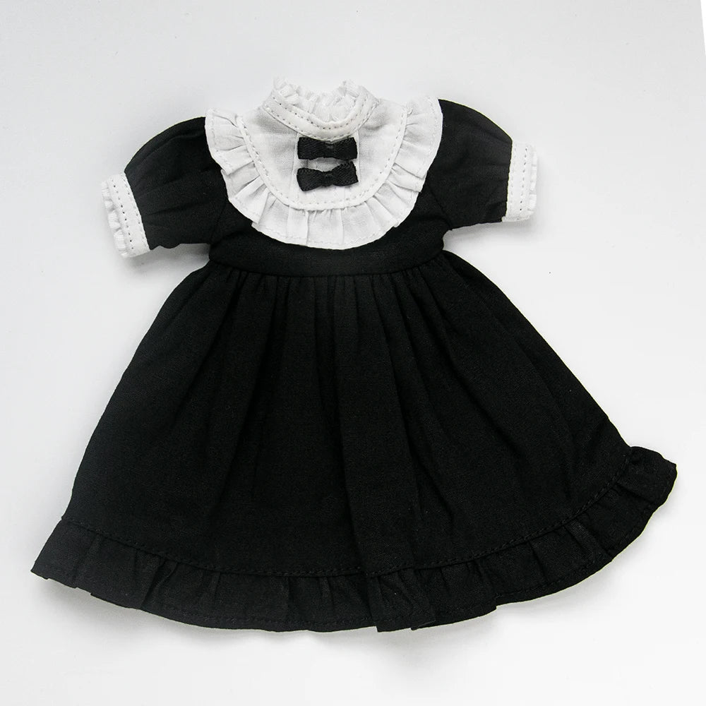 Black vintage lace maid dress with white ruffled collar and cuffs for a doll