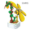 A set of 214 plastic building blocks depicting a tree with rose flowers and a yellow butterfly.