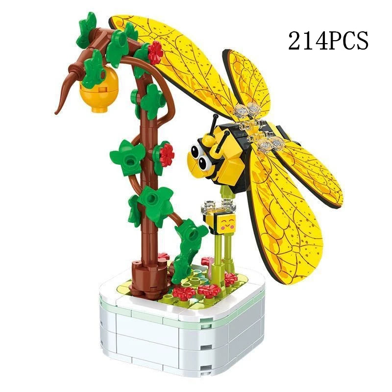A set of 214 plastic building blocks depicting a tree with rose flowers and a yellow butterfly.