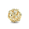 A gold charm bracelet featuring pendants shaped like an elephant, key, butterfly, and heart.
