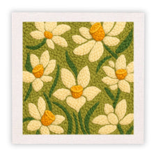A punch needle embroidery kit featuring a green background with yellow and white flower patterns.