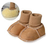 Pair of tan suede baby booties with ribbed cuffs and a plush fur lining shown next to a close-up of the lining.