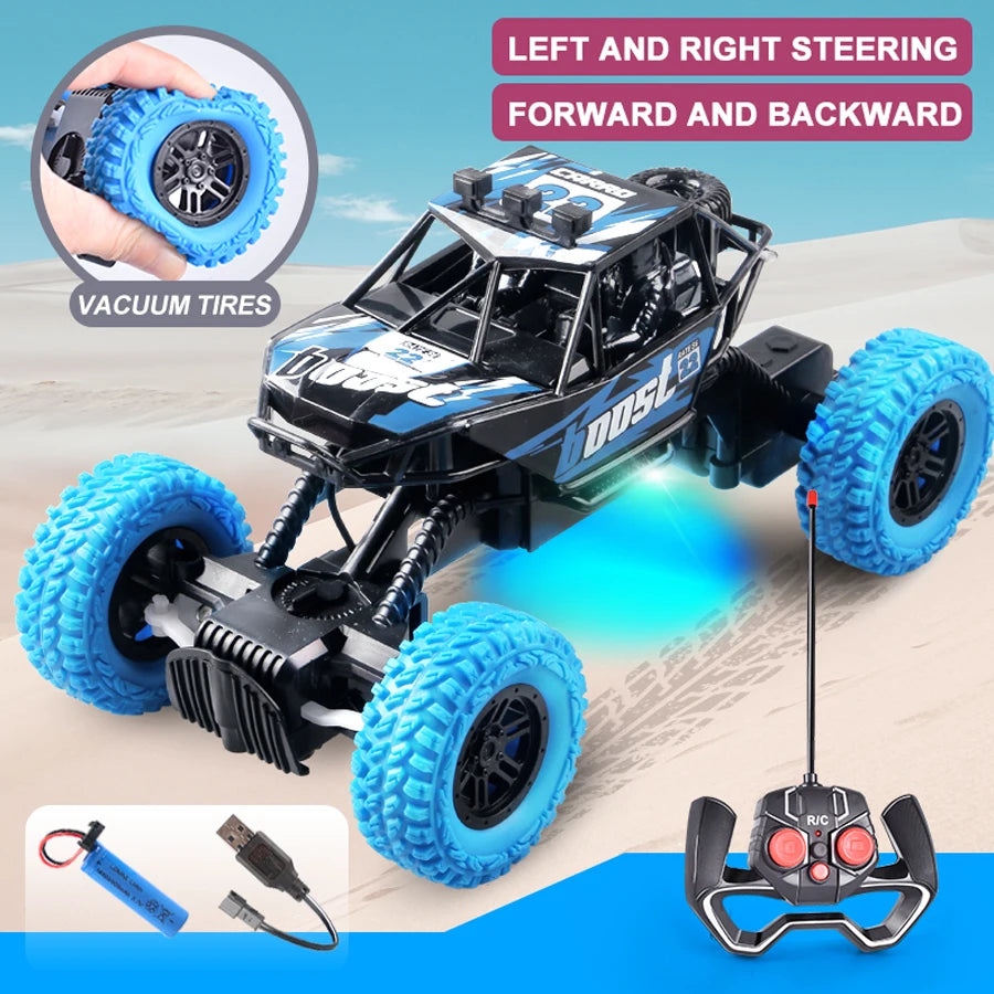A black off-road remote control car with blue vacuum tires and flashing lights is shown on a sandy surface.