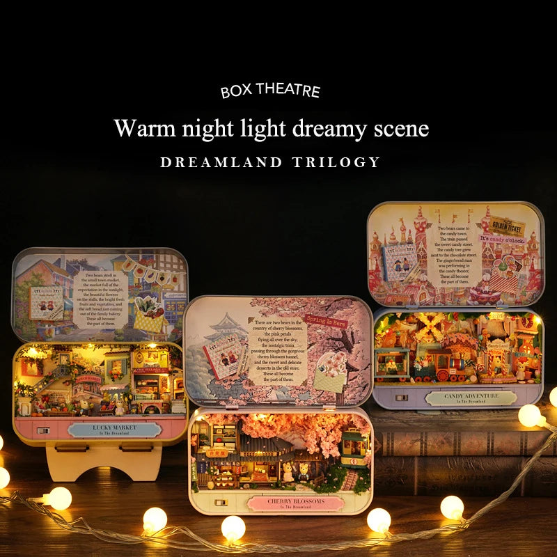Box theatre set featuring various miniature scenes and furniture for a dreamland trilogy