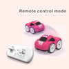 A pink remote control car and its corresponding controller are shown with a text overlay indicating the remote control mode.
