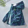 A dark blue and teal waterproof winter jacket for kids with a hood, displayed on a white surface.