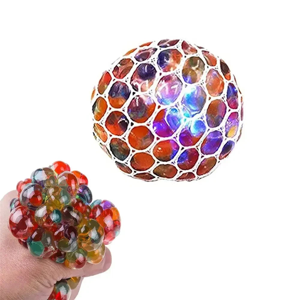 A close-up view of a spherical water bead stress ball with iridescent, colorful beads.