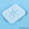 A translucent silicone mold with a festive star design used for jewelry and craft projects.