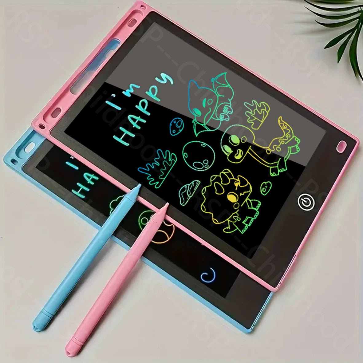 A pink and blue LCD writing tablet displaying happy emojis and a green stylus pen.