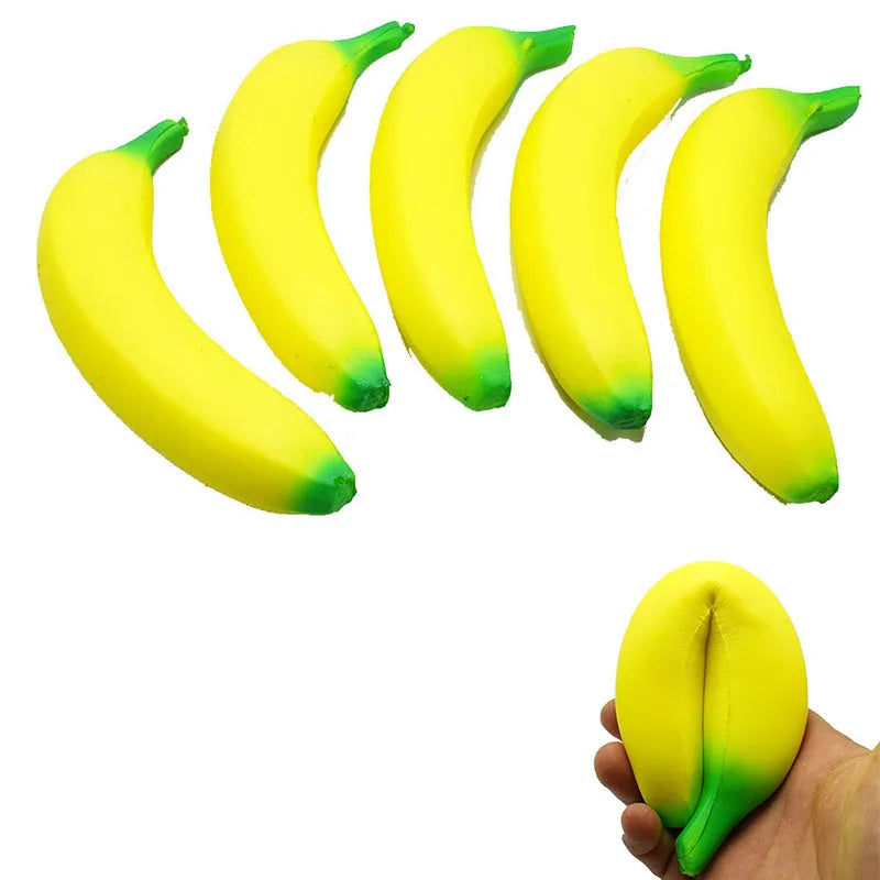A cluster of bright yellow banana-shaped squishy toys with green tips.