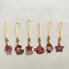 A set of six metal keychains featuring character pendants from Stranger Things.