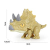 A light tan finger dinosaur fidget toy with movable joints and a Jurassic biting look.