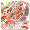 A colorful sticker book featuring scenes of a tiny cabin and various DIY craft elements.