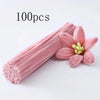 A bundle of 100 pink chenille craft pipe cleaners with a single flower attached.