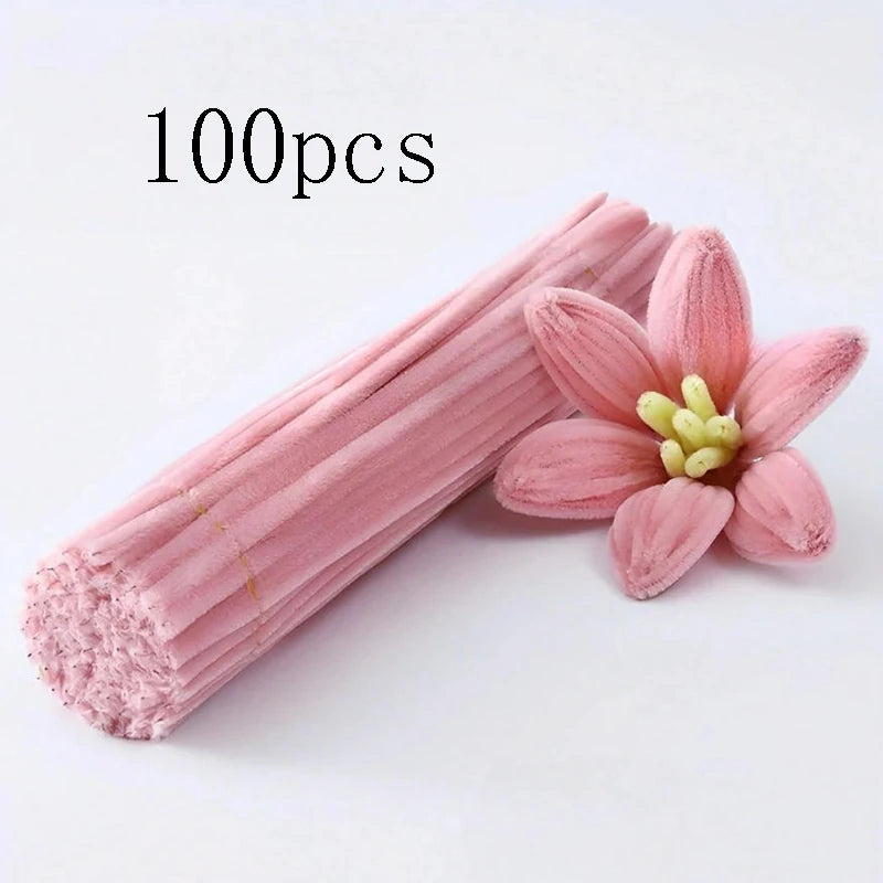 A bundle of 100 pink chenille craft pipe cleaners with a single flower attached.
