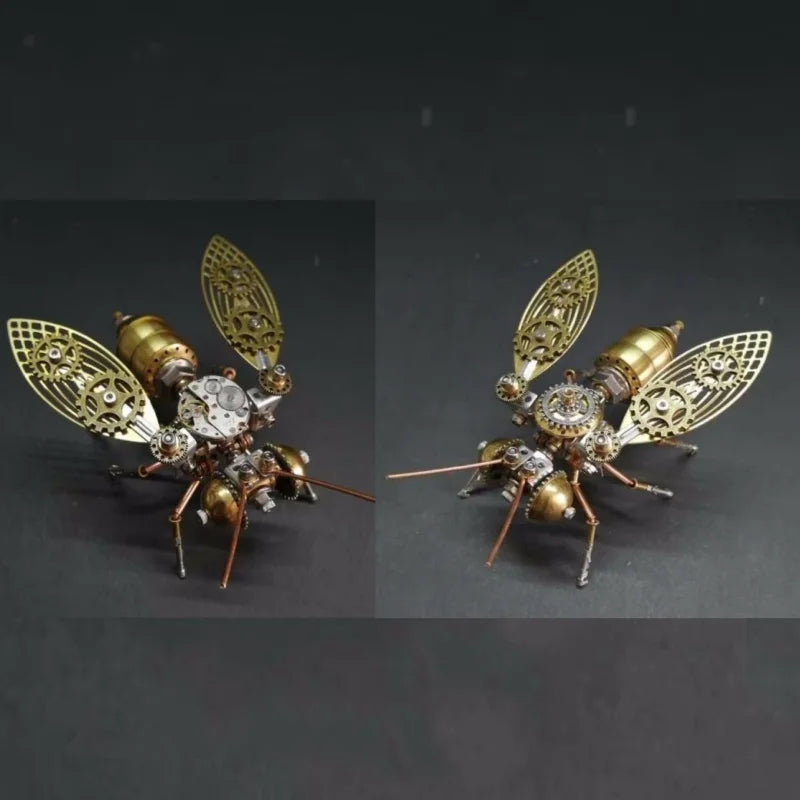 Steampunk mechanical bee model kit showing a detailed insect-like figure with gold and silver metal parts