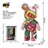 A small bear figure made of micro building blocks with colorful paint and fabric details.