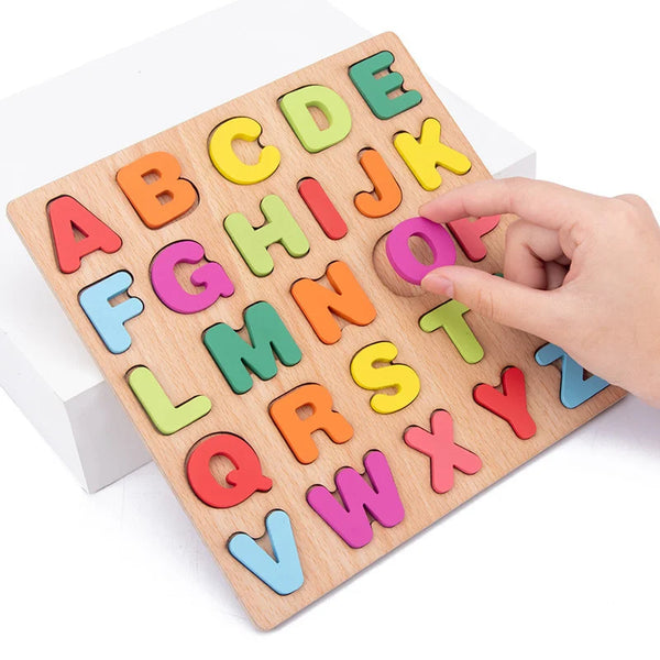 A wooden alphabet matching puzzle with colorful letter tiles laid out on a white surface.
