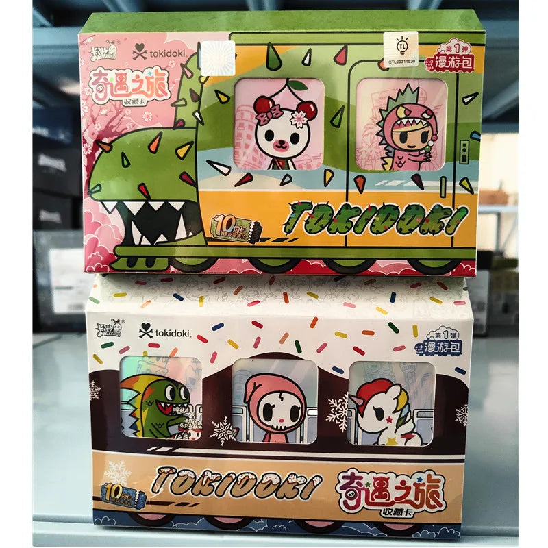 A box of Tokidoki collectible cards featuring a dinosaur design and the series title.