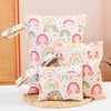 A pack of three colorful rainbow-themed waterproof bags for swimsuits, diapers, and travel items.