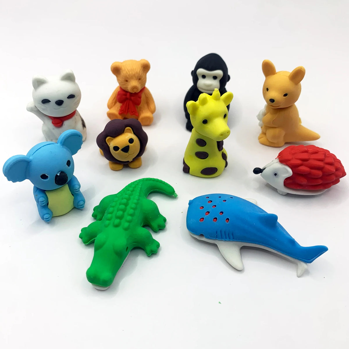 A collection of cute 3D puzzle animal erasers in various colors and shapes.