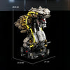 A detailed mechanical model kit of a dragonfly, featuring intricate parts and glowing yellow accents.
