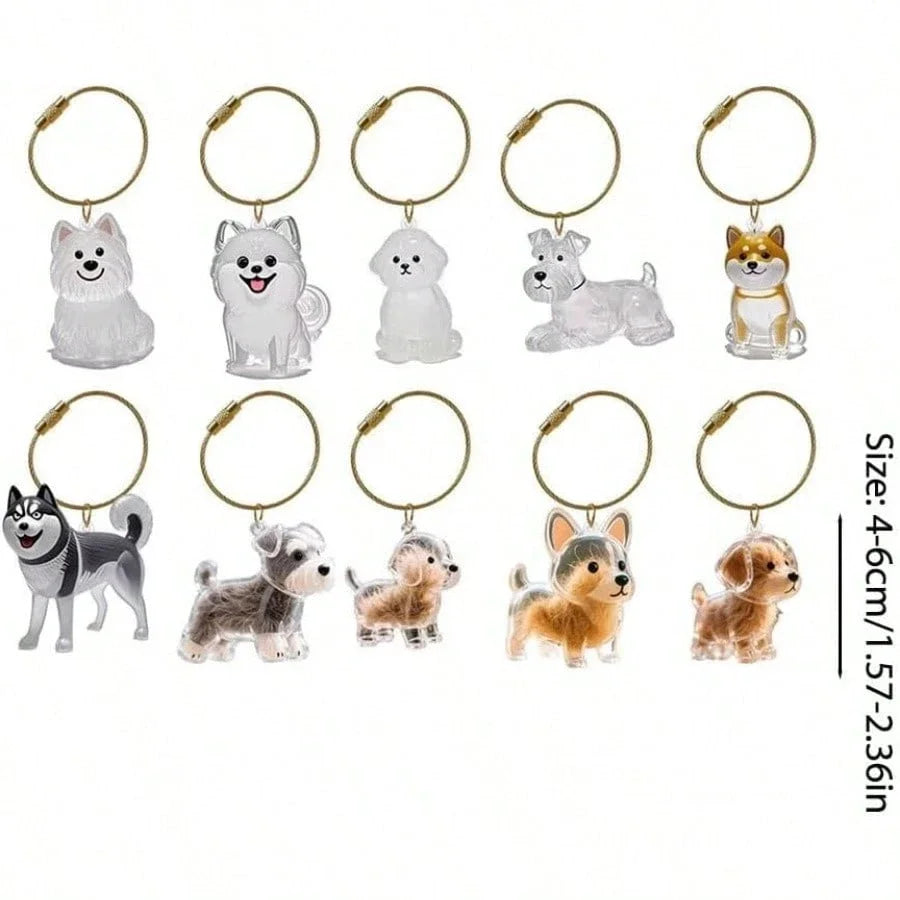 A collection of dog-shaped pet hair keepsake keychains featuring various breeds and sizes.