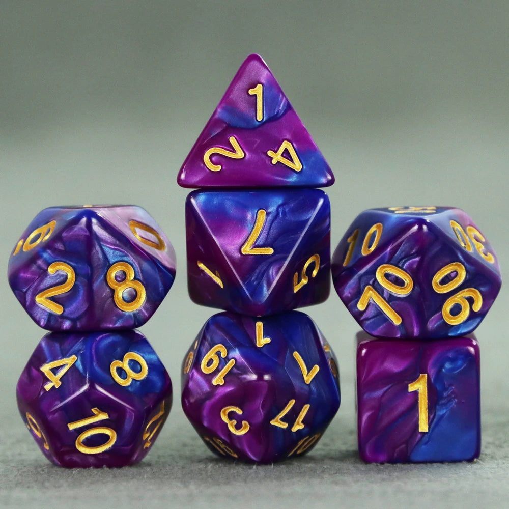 A set of purple polyhedral dice, including a tetrahedron and a d10, displayed on a gray surface.