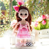 A 17cm articulated princess doll with long brown hair wearing a pink and white striped dress and a large pink bow.