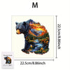 A wooden jigsaw puzzle depicting a bear in a forest landscape with vibrant colors.